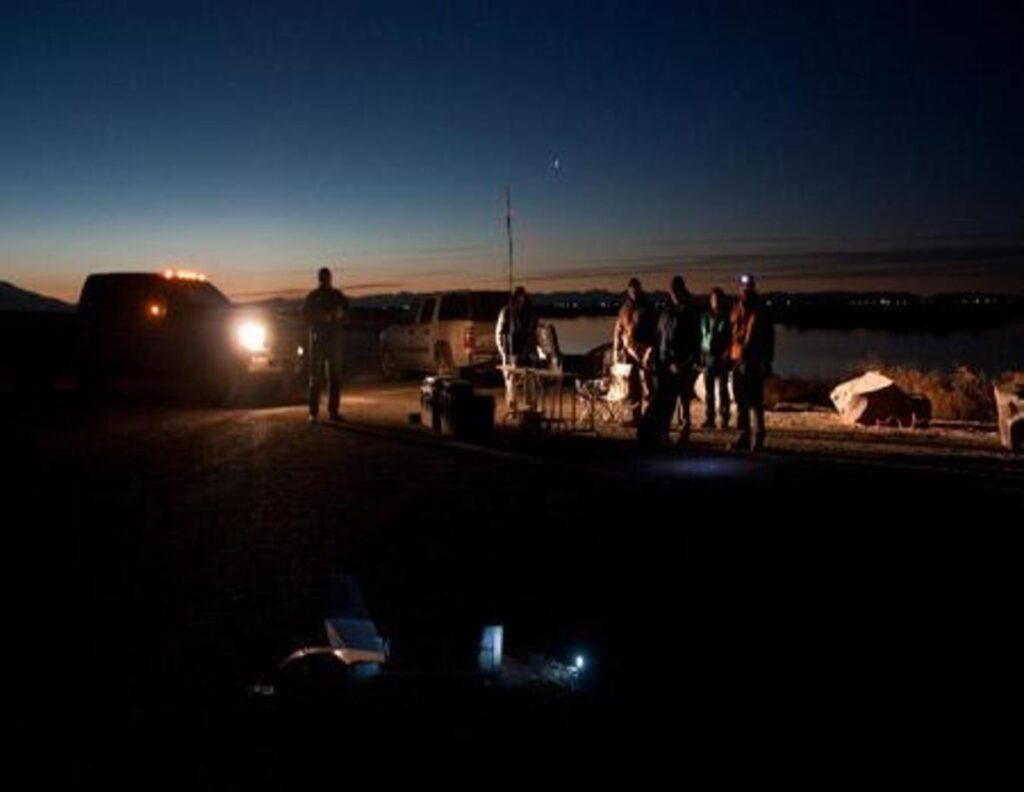 USGS scientists prepare to launch the Raven-A sUAS at the start of civil twilight. Credit: USGS Fort Collins Science Center
